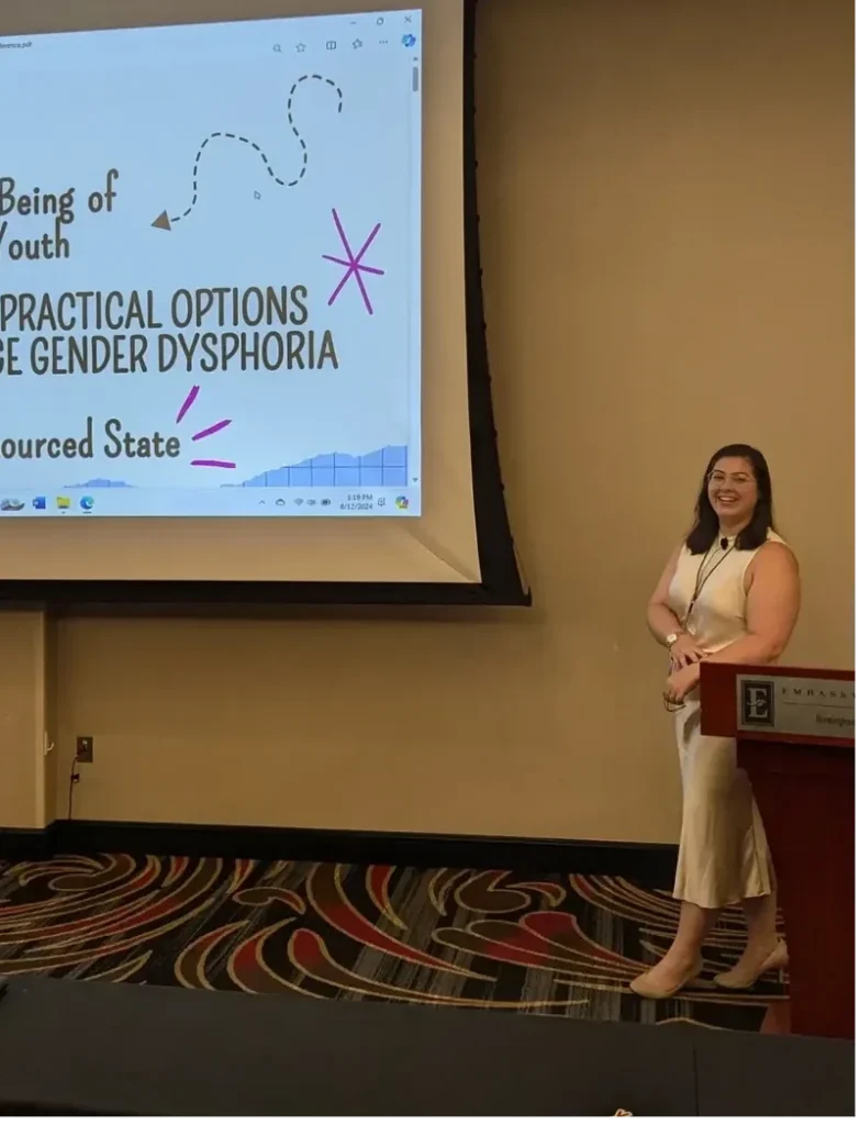 Christa McCrorie, LICSW-S PIP, Owner of Creative Therapeutic Solutions, LLC, speaking at a social work conference hosted by the University of Montevallo 8/12/24
