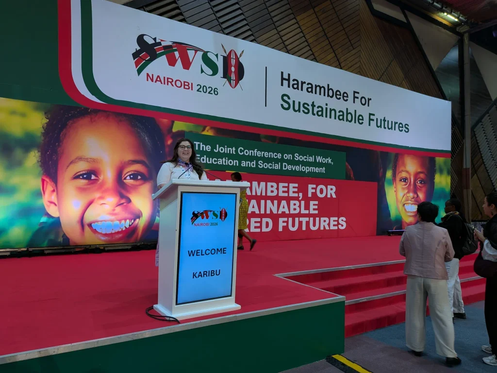 Christa McCrorie, LICSW-S, PIP; CD (DONA); CST (SHA) speaks at the Joint World Conference of Social Work and Social Development in Nairobi, Kenya, June 2026